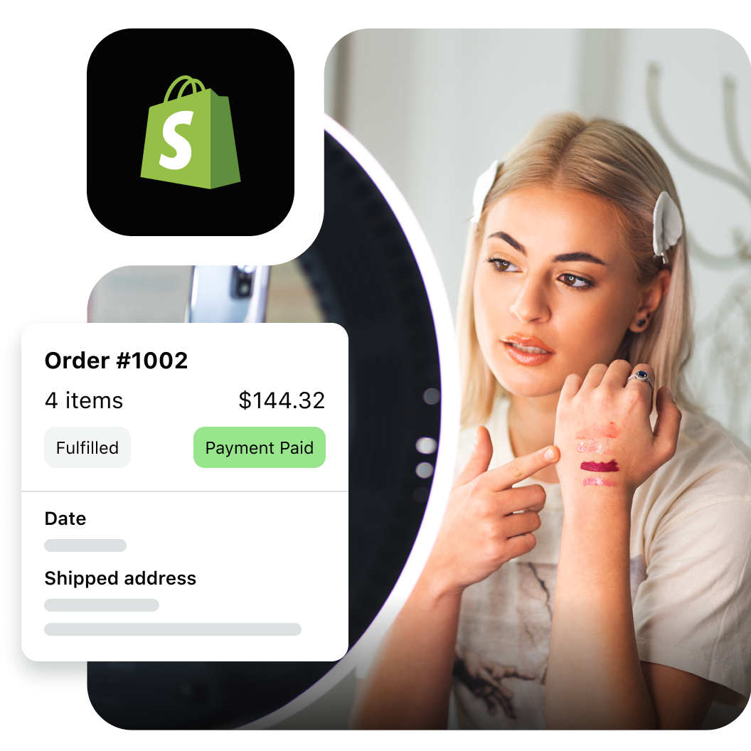 Shopify influencer marketing dashboard showing order #1002 with 4 items totaling $144.32 marked as fulfilled and payment paid, with a content creator reviewing the order details alongside the Shopify logo